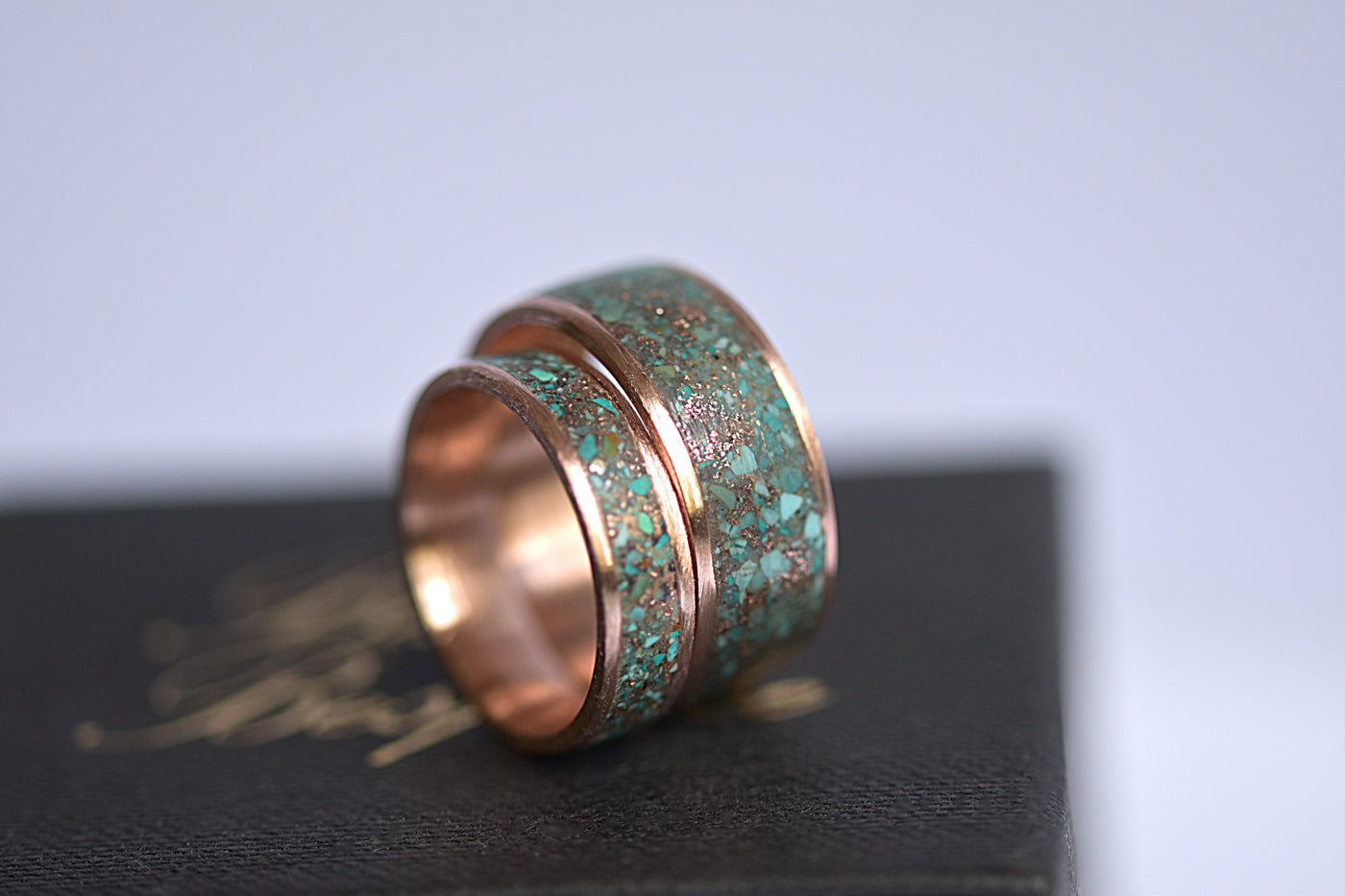 Matching Gold Inlay Wedding Bands Stood Together