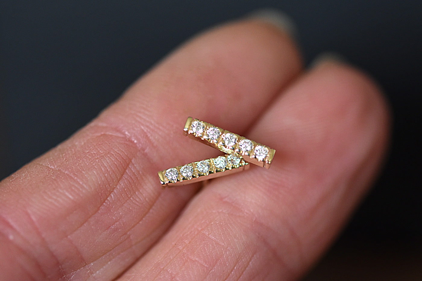 9ct Gold Moissanite Diamond Bar Studs in Hand