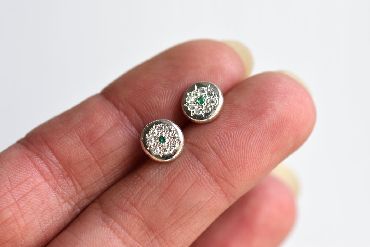 English Rose Emerald Stud Earrings in Hand