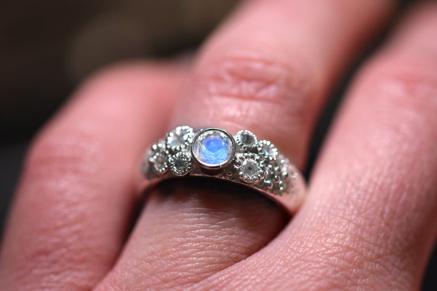 Magic Moonstone Ring with Diamonds being Worn