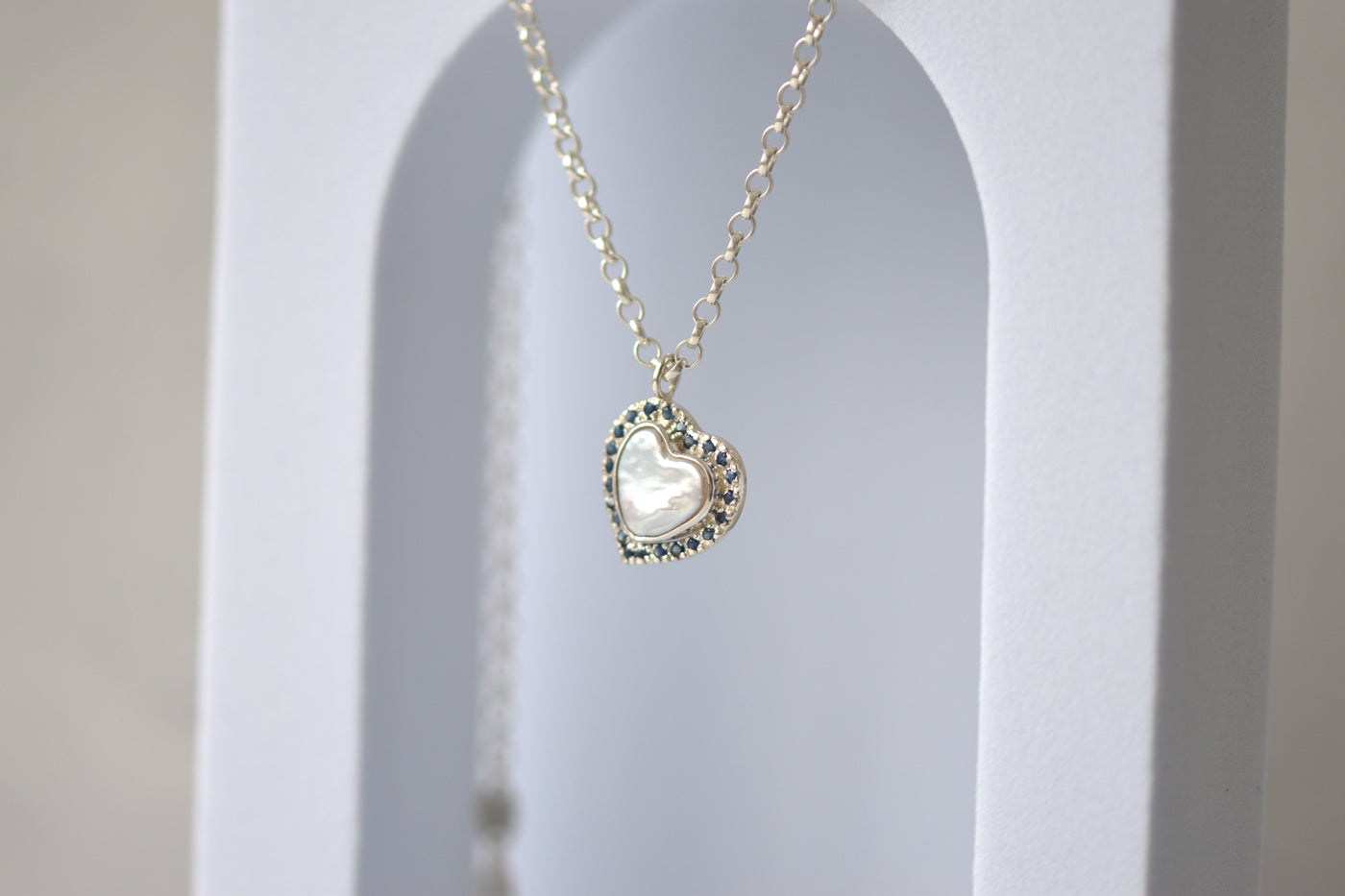 Pearl Heart and Sapphire Pendant Hung