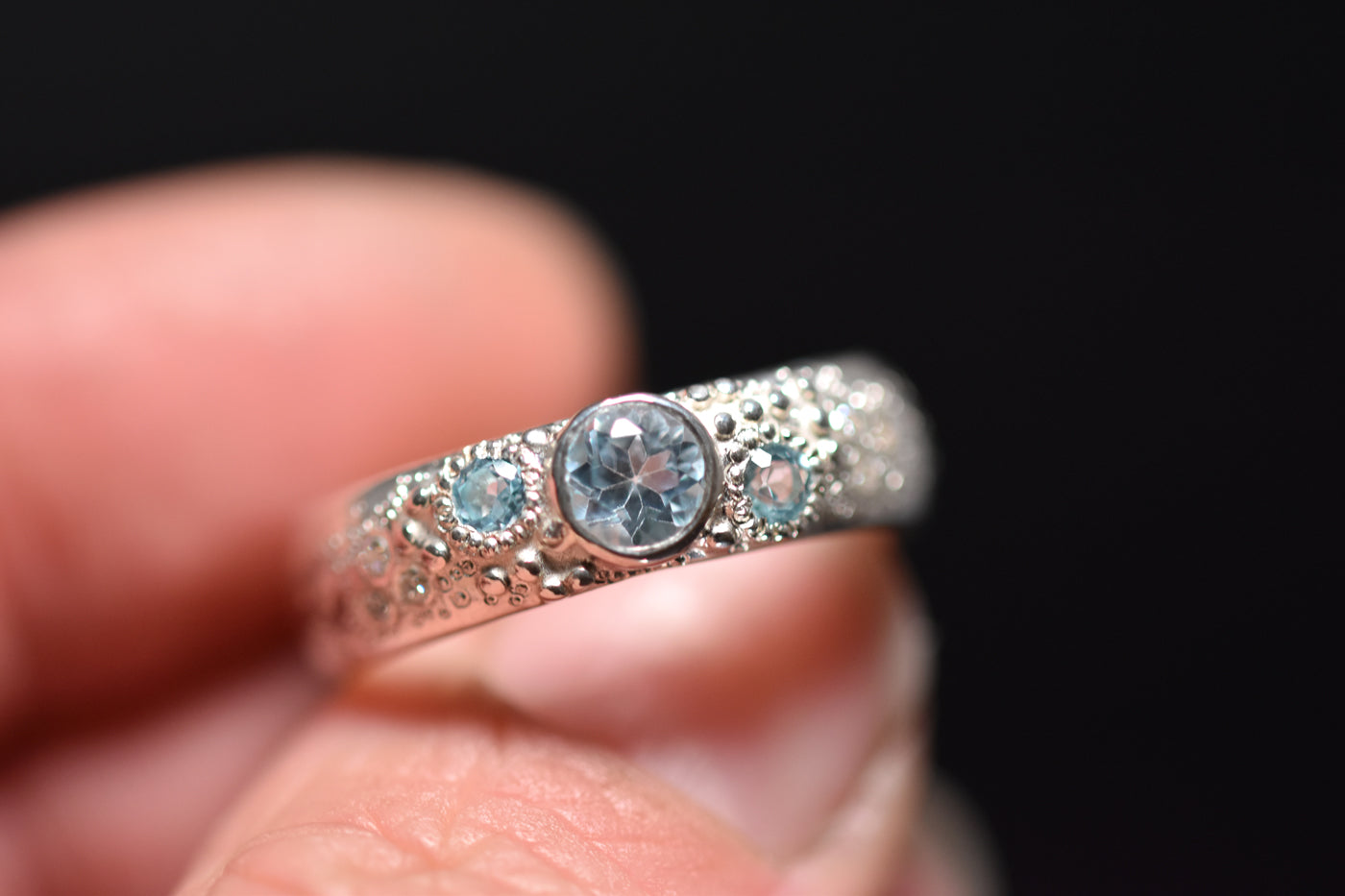 Blue Topaz Sirens Ring Black Background