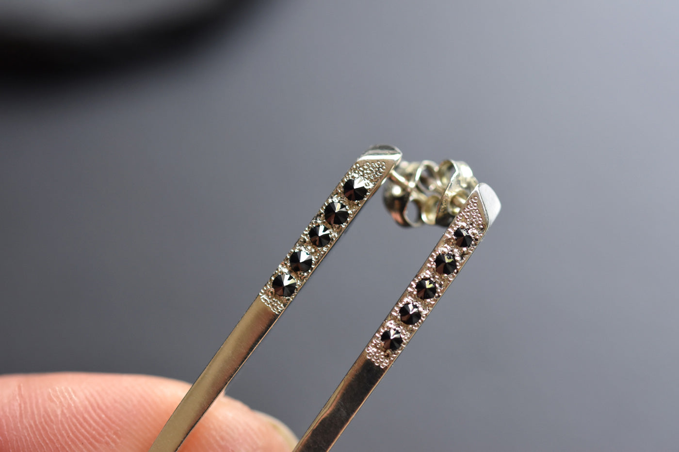 Talon Spike Earrings in Hand