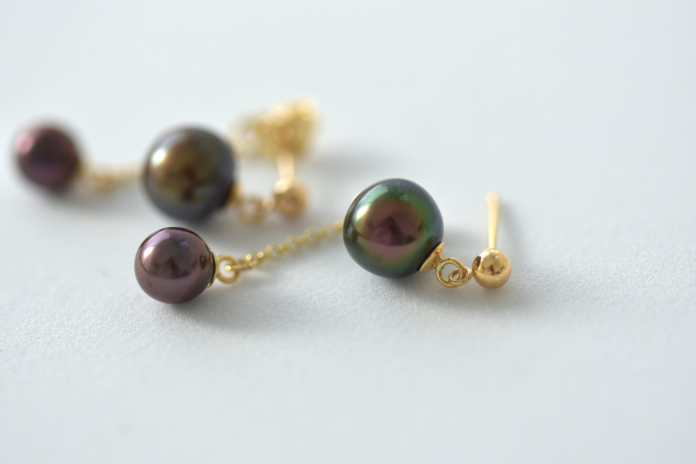 Black Pearl Front Back Earrings Laid Down