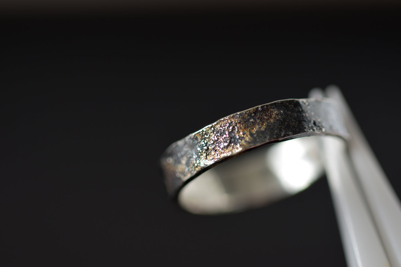 Molten 18ct Gold and Sterling Silver Ring in Tweezers