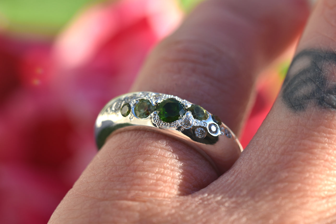 Rainforest Ring with Chrome Diopside, Peridot & Diamonds being Worn